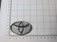Эмблема шильдик логотип Toyota на руль закрытая 65*42 мм
