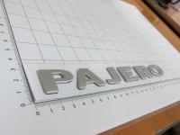 Эмблема шильдик Pajero для Mitsubishi на багажник 205*23 мм