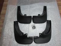 Оригинальные брызговики на Mazda 2003