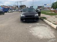 Mitsubishi Lancer X  Передний Бампер Varis версия 3 (Абс пластик)