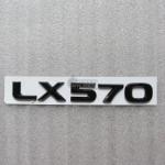 Шильдик LX 570 Lexus на крышку багажника 185x26 мм с клеевой основой.