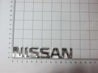 Эмблема шильдик Nissan на багажник маленькая 122 х 22 мм